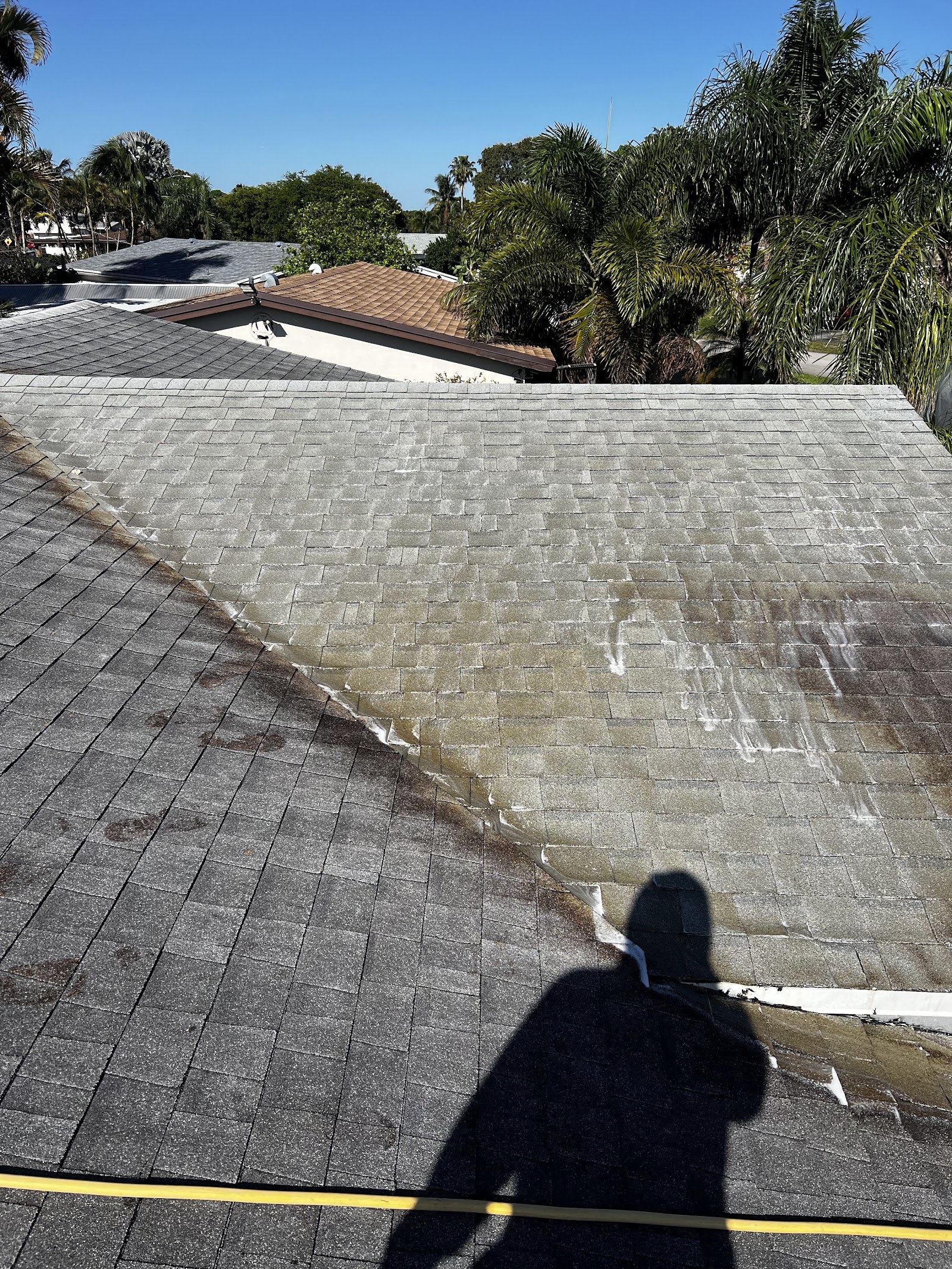 Tile roof mid soft-wash — years of algae lifting away