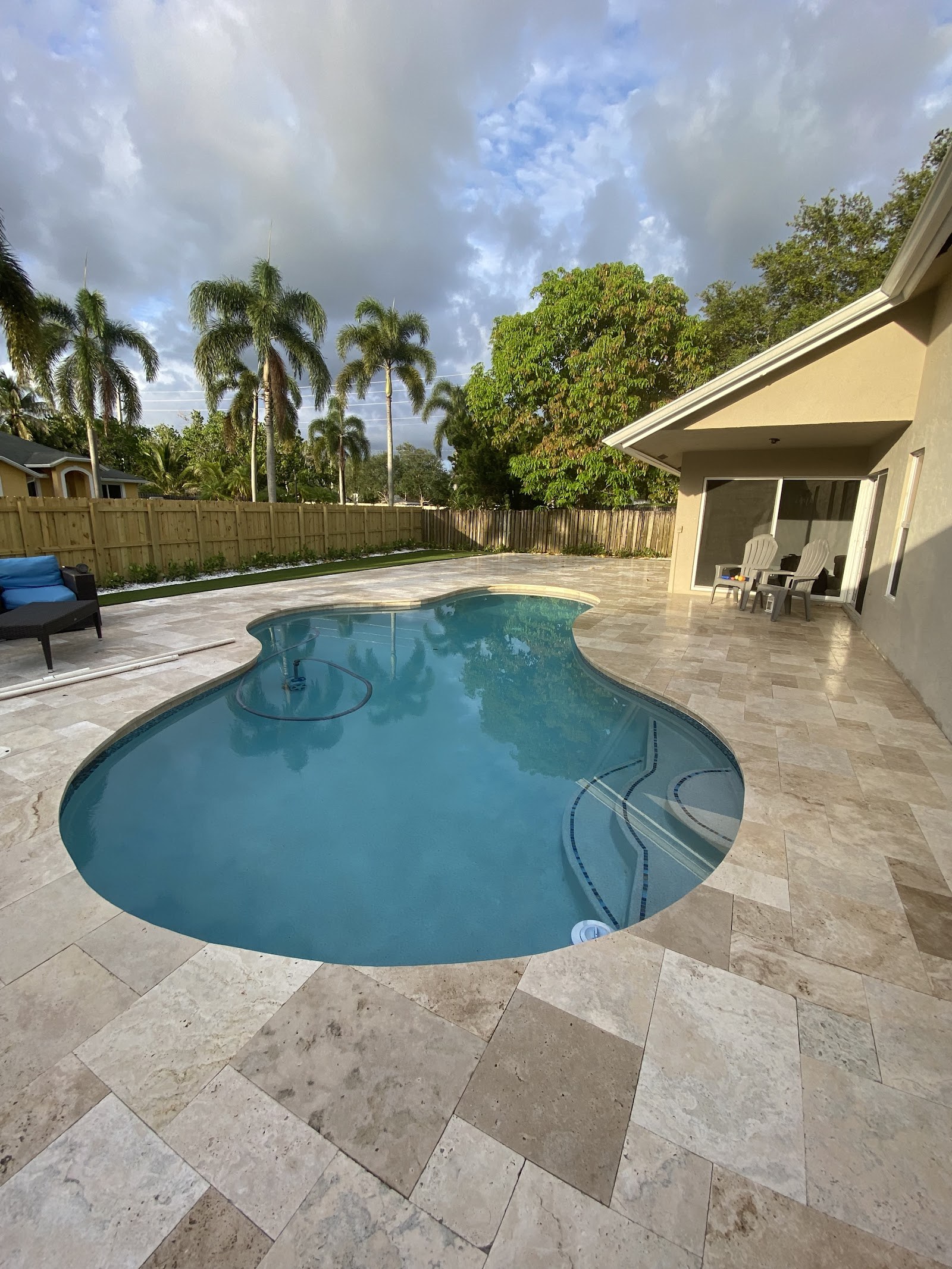 Travertine pool deck and pavers, freshly cleaned