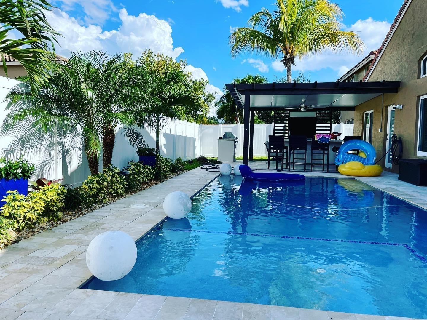 Pool cage travertine deck, rinsed clean